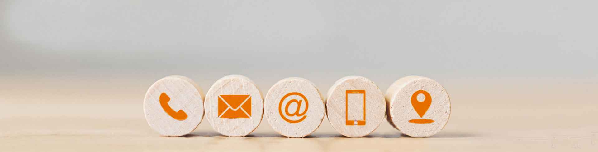 Contact methods icons: phone, email, @ symbol for web, mobile phone, and location pin